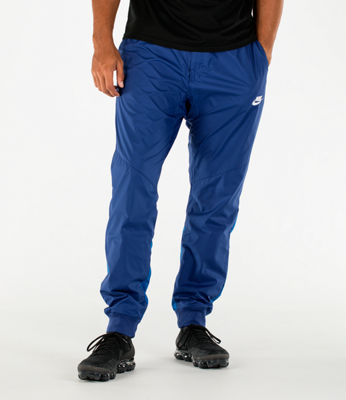 nike windrunner pants blue