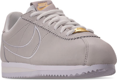 Three Quarter view of Women';;s Nike Classic Cortez 90 Premium Casual Shoes in Summit White/Phantom/Metallic Gold