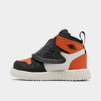orange and black ones low top